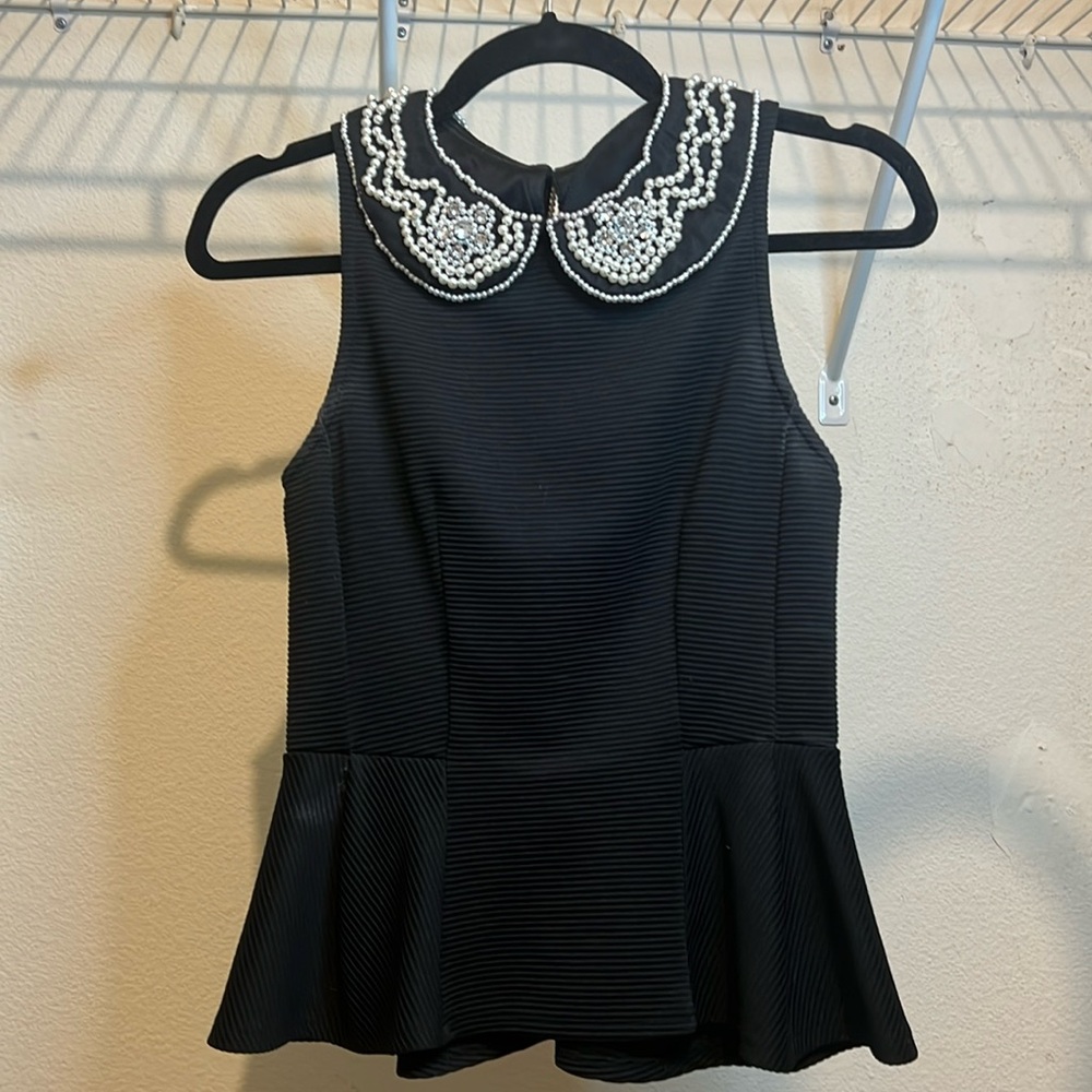 TOPSHOP black peplum top; pearl embellishment along Peter Pan collar; stretch